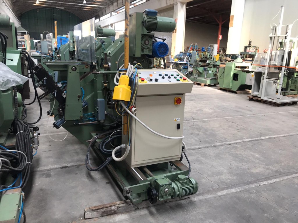 Usato 1990 Tenonatrice stondante doppia, automatica, marca Bacci