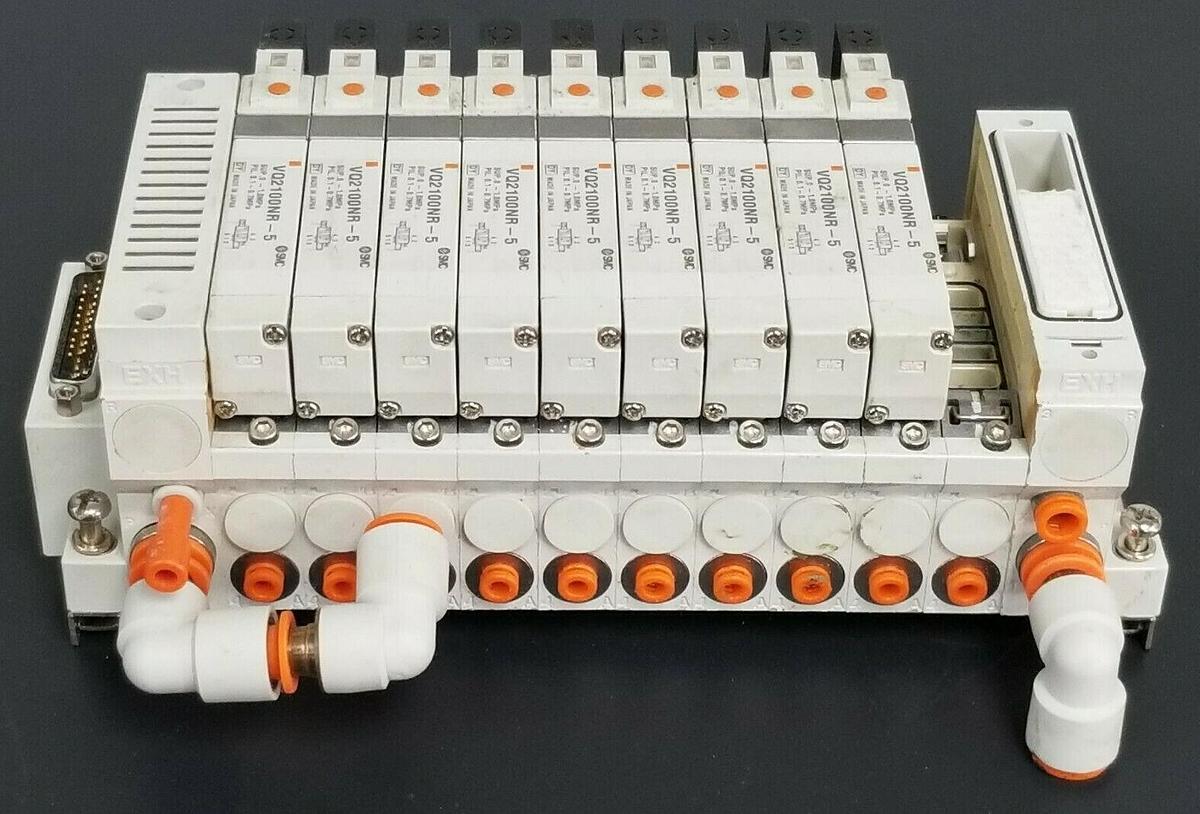 Used SMC 10 POS. MANIFOLD BLOCK WITH (9) VQ2100NR-5 PLUG-IN SOLENOID VALVES VQ2100NR5