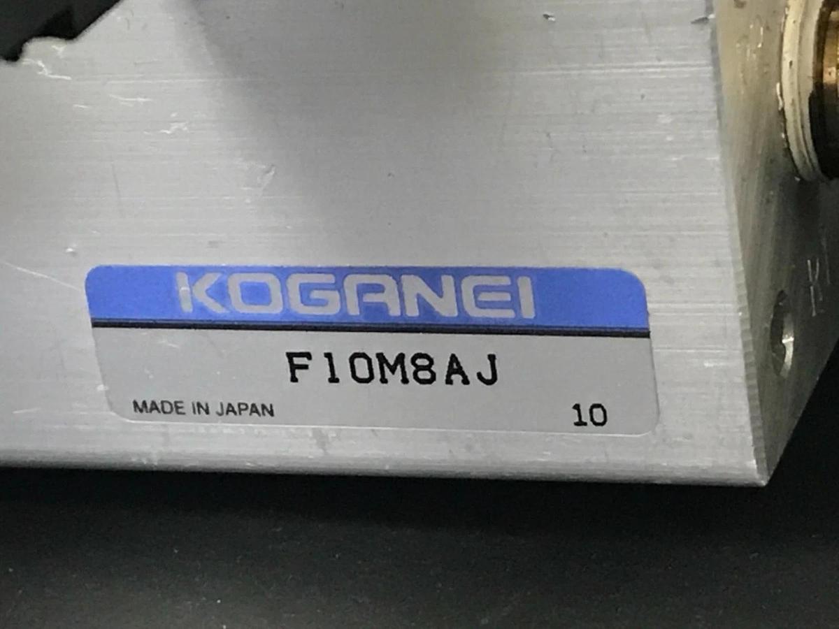 Used KOGANEI F10M8AJ SOLENOID MANIFOLD BLOCK WITH (4) F10T2-CPL3 VALVES