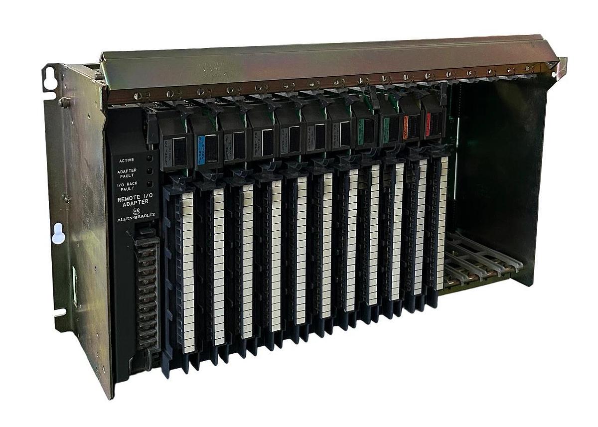 Used ALLEN BRADLEY 1771-A4B SER B 16-SLOT I/O CHASIS W/ MODULES
