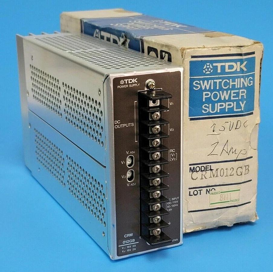 Used TDK CRM012GB SWITCHING POWER SUPPLY 60W 2AMP 15V OUTPUT 100/115V INPUT