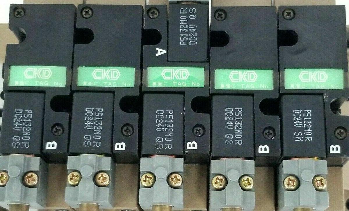 Used CKD 022001 MANIFOLD BLOCK W/ (5) 4L219 & (1) 4L229 SOLENOID VALVES, P5132M0R