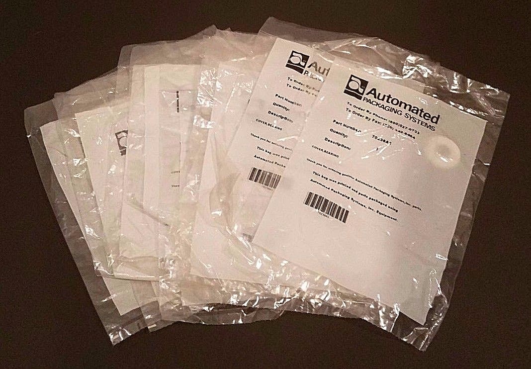 LOT OF 13 NEW AUTOMATED PACKAGING SYSTEMS 70236A1 BEARING COVERS