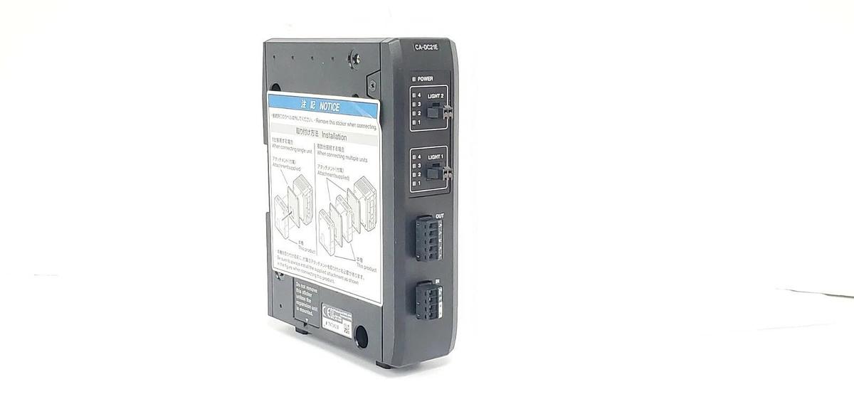 NEW KEYENCE CA-DC21E ILLUMINATION EXPANSION UNIT 12-24VDC 3-6.5A CADC21E