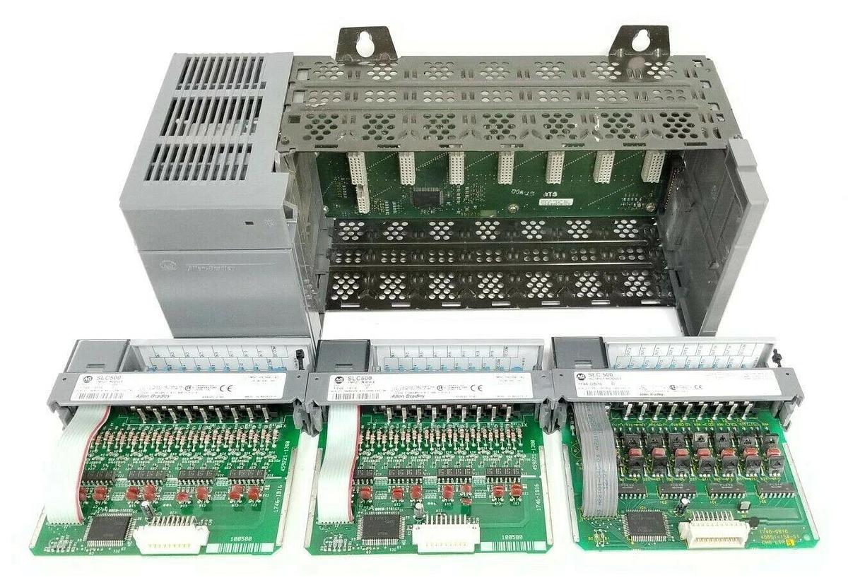 Used ALLEN BRADLEY 1746-A7 SLOT RACK W/ 1746-P2 , (2) 1746-IB16 , 1746-OB16 (DAMAGED)