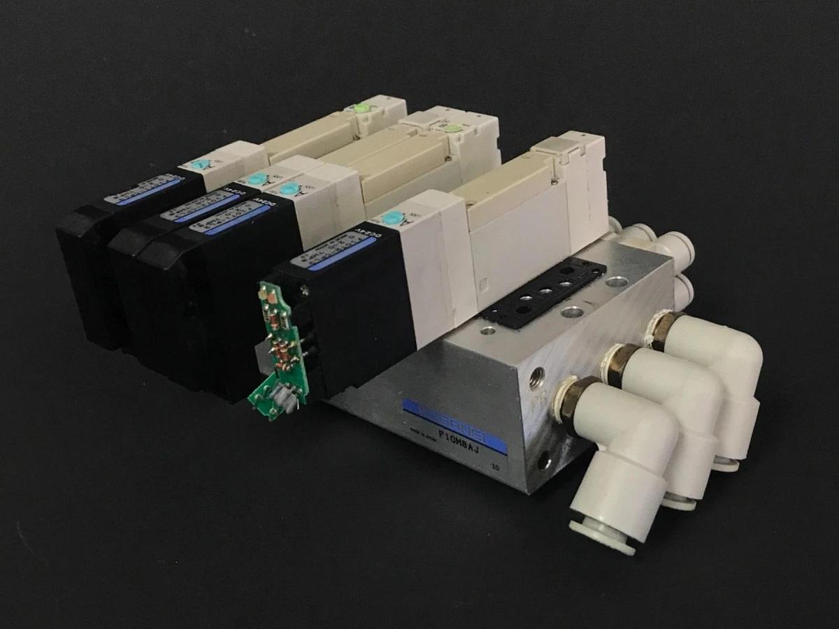 Used KOGANEI F10M8AJ SOLENOID MANIFOLD BLOCK WITH (4) F10T2-CPL3 VALVES