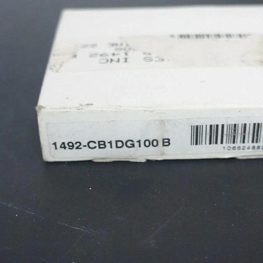 NIB ALLEN BRADLEY 1492-CB1DG100 CIRCUIT BREAKER 10 AMP, 1492CB1DG100, SER. B