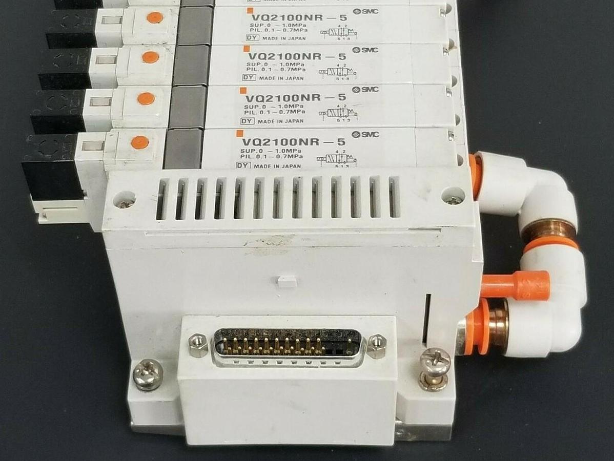 Used SMC 10 POS. MANIFOLD BLOCK WITH (9) VQ2100NR-5 PLUG-IN SOLENOID VALVES VQ2100NR5