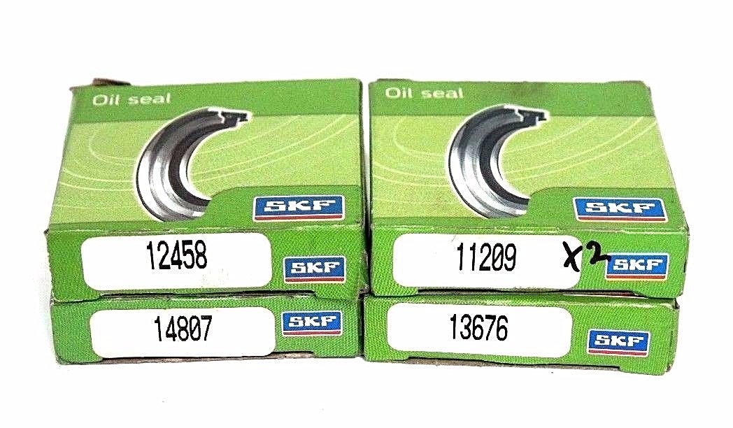 Used LOT OF 5 SKF OIL SEALS (2) 11209 (1) 13676 (1)12458 (1) 14807
