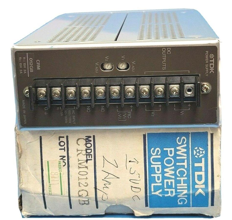 Used TDK CRM012GB SWITCHING POWER SUPPLY 60W 2AMP 15V OUTPUT 100/115V INPUT