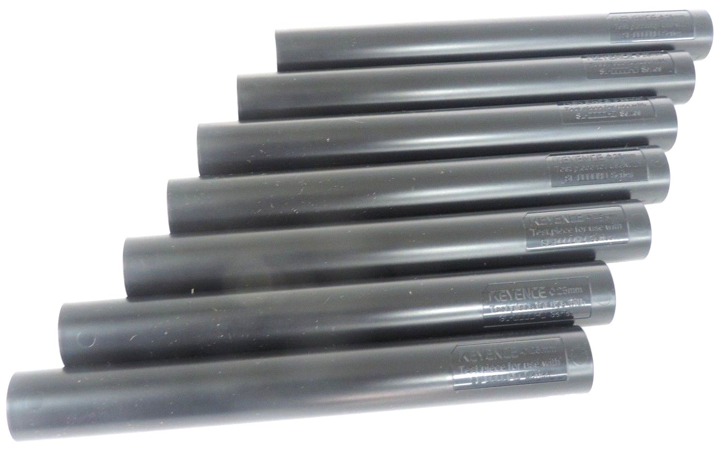 Used LOT OF 7 NEW KEYENCE 25MM TEST PIECES FOR USE WITH SL-0000H0 SERIES