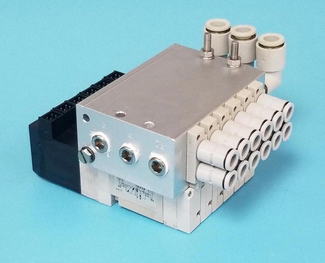 Used KOGANEI F10M6AJ BASE W/ 6 F10T1-CPL3 SOLENOID VALVES DC24V