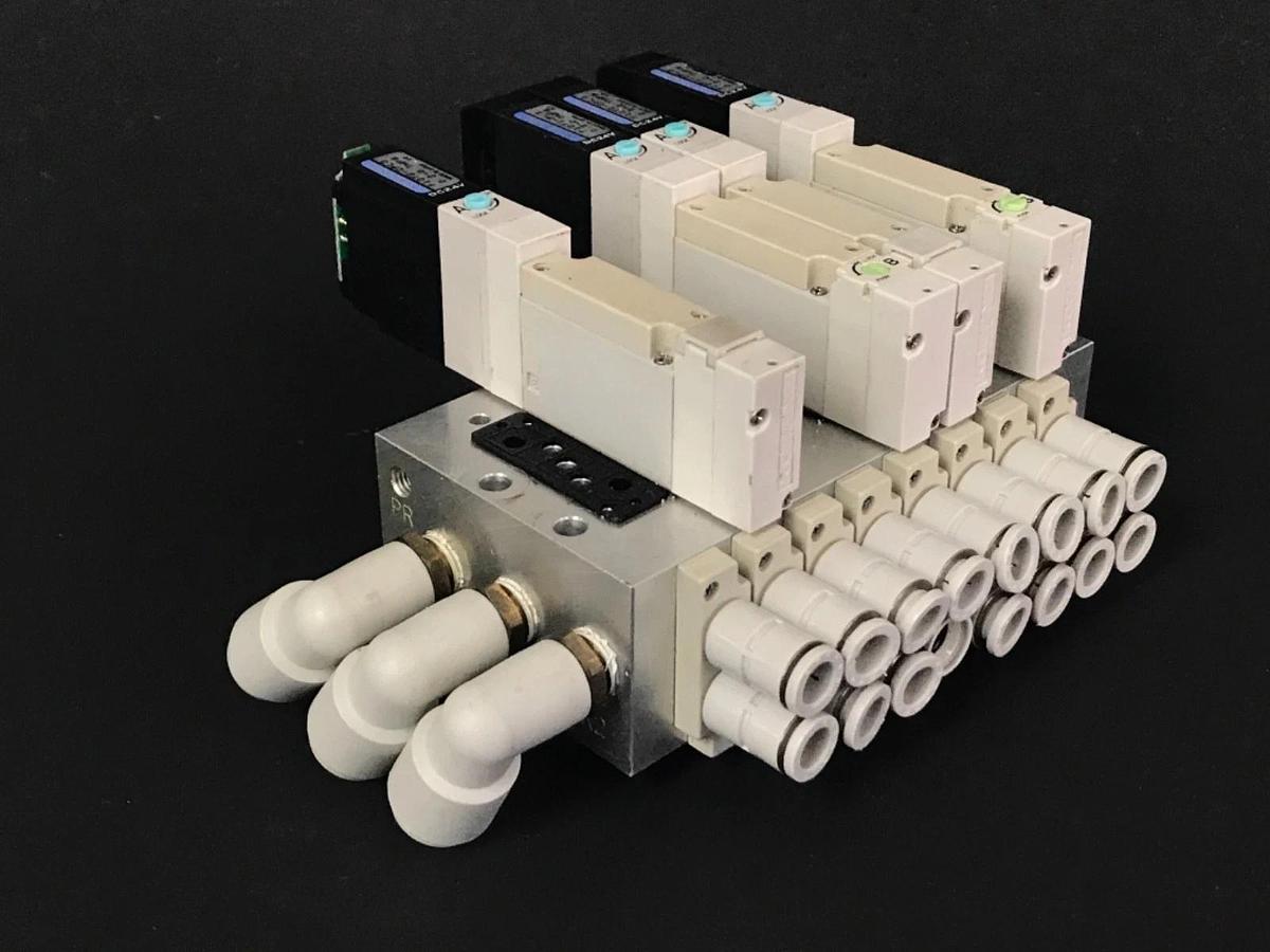 Used KOGANEI F10M8AJ SOLENOID MANIFOLD BLOCK WITH (4) F10T2-CPL3 VALVES