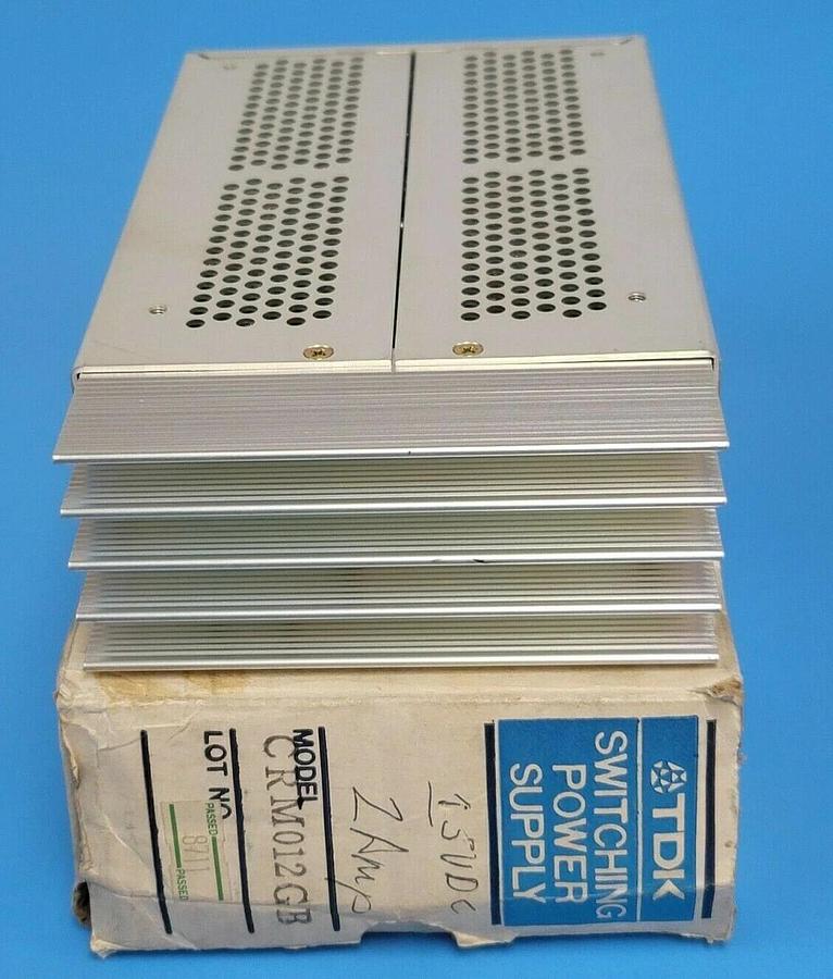 Used TDK CRM012GB SWITCHING POWER SUPPLY 60W 2AMP 15V OUTPUT 100/115V INPUT