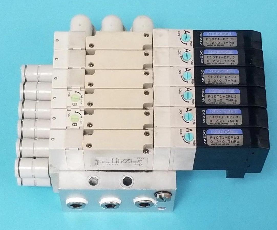 Used KOGANEI F10M6AJ BASE W/ 6 F10T1-CPL3 SOLENOID VALVES DC24V