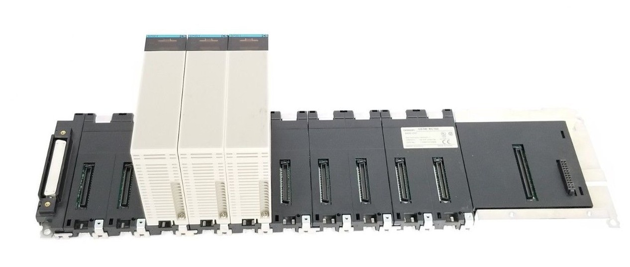 Used OMRON CS1W-BC102 SLOT RACK BASE UNIT W/ (3) CS1W-SP001 SPACE UNITS