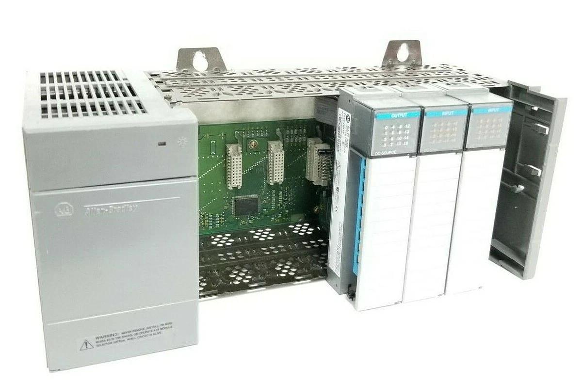 Used ALLEN BRADLEY 1746-A7 SLOT RACK W/ 1746-P2 , (2) 1746-IB16 , 1746-OB16 (DAMAGED)