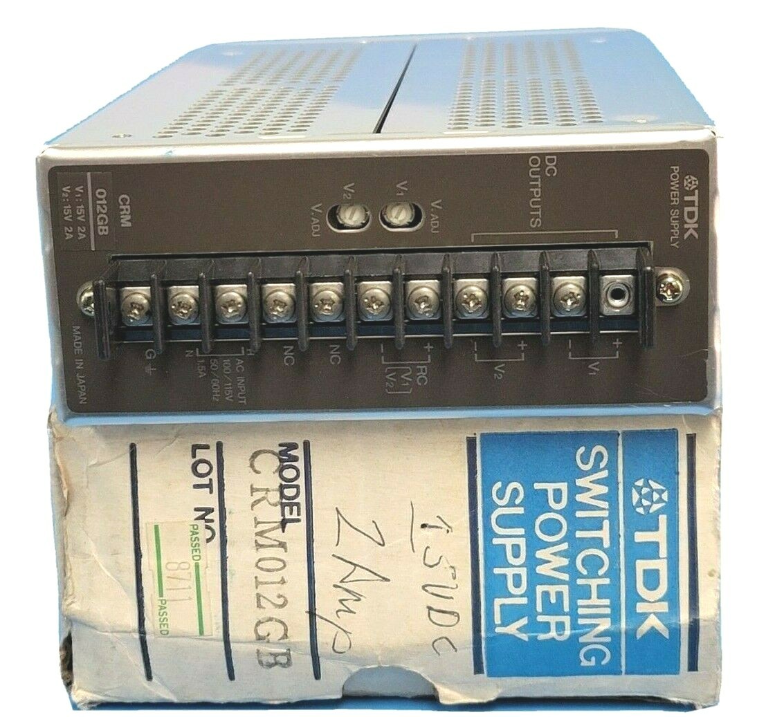 Used TDK CRM012GB SWITCHING POWER SUPPLY 60W 2AMP 15V OUTPUT 100/115V INPUT