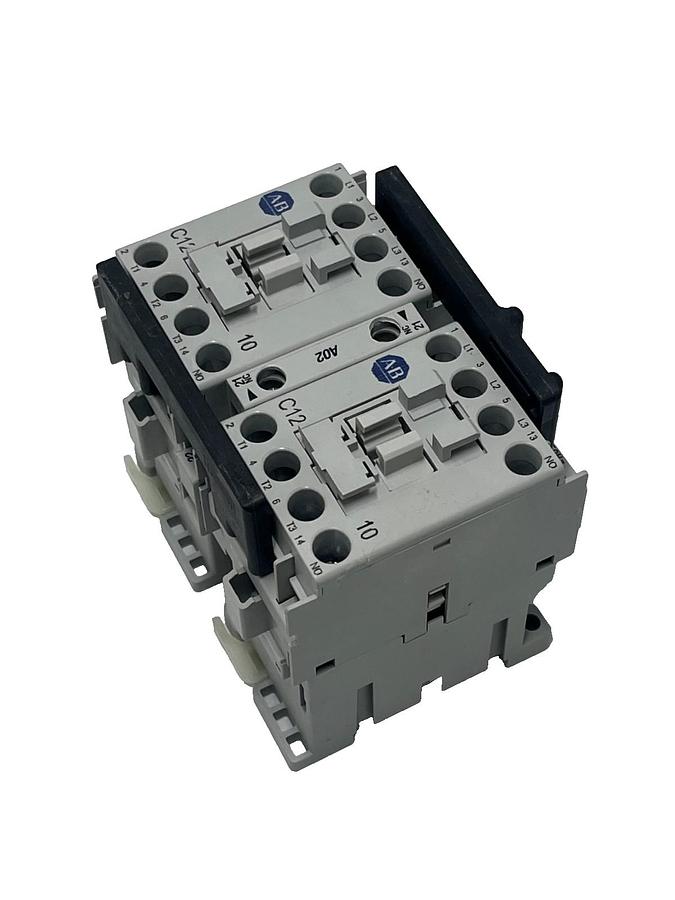 Used Allen-Bradley 104-C12D22 Ser B IEC Reversing Contactor 12A 110/120V AC Coil NSMP