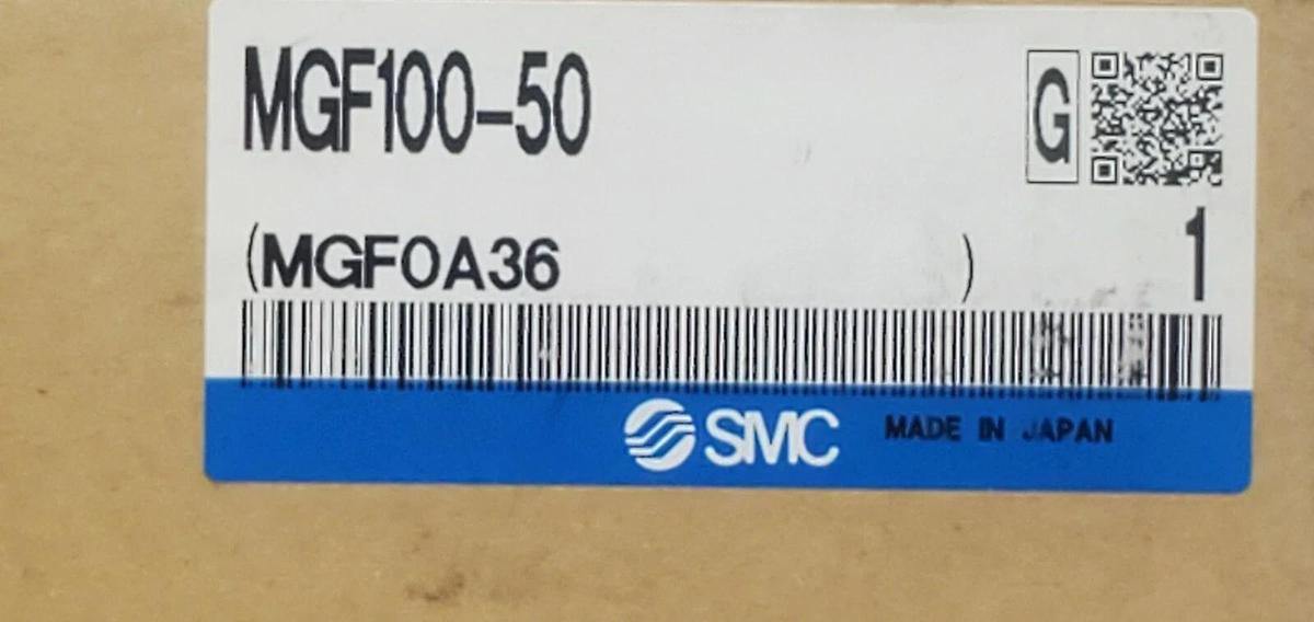 Used NIB SMC MGF100-50 GUIDE CYLINDER MGF10050