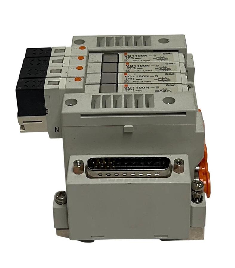 Used SMC EXH MANIFOLD BANK/BLOCK 4-PORT W/ VQ1100N-5 SOLENOID VALVES 24VDC USNP