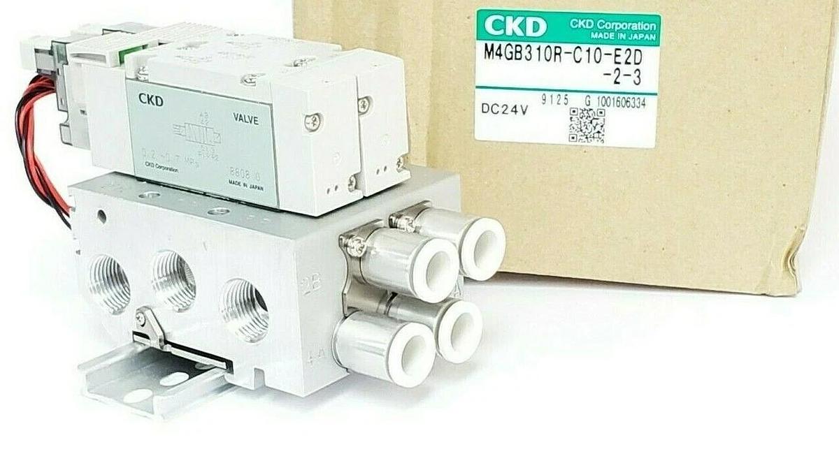 Used NIB CKD M4GB310R-C10-E2D-2-3 VALVE MANIFOLD ASSEMBLY DC24V M4GB310RC10E2D23