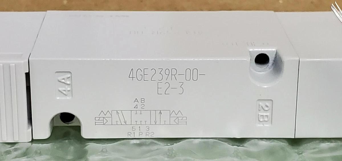 Used NEW CKD CORP. 4GE239R-00-E2-3 DISCRETE VALVE DC24V 4GE239R00E23