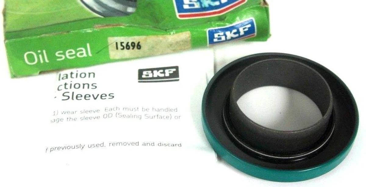 Used NIB SKF 15696 OIL SEAL AND SLEEVE KIT 1.563 X 2.623 X .750
