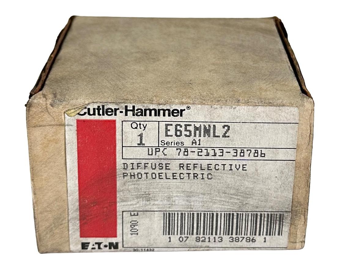 Used NEW CUTLER-HAMMER E65MNL2 SERIES A1 DIFFUSE REFLECTIVE PHOTOELECTRIC SENSOR NSMP
