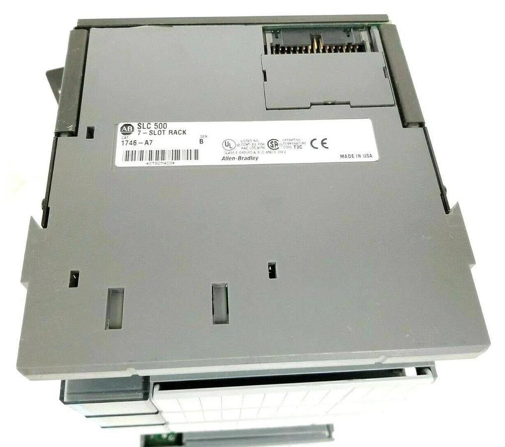 Used ALLEN BRADLEY 1746-A7 SLOT RACK W/ 1746-P2 , (2) 1746-IB16 , 1746-OB16 (DAMAGED)