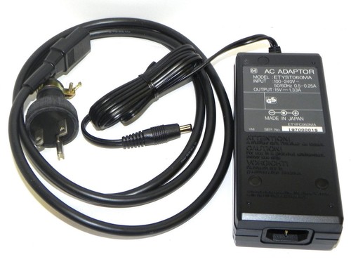 Used ZEROS ETYST060MA AC ADAPTOR INPUT: 100-240V~50/60HZ 0.5-0.25A OUTPUT: 15V 1.33A