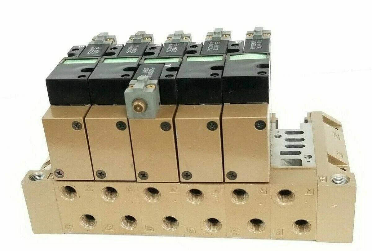 Used CKD 022001 MANIFOLD BLOCK W/ (5) 4L219 & (1) 4L229 SOLENOID VALVES, P5132M0R