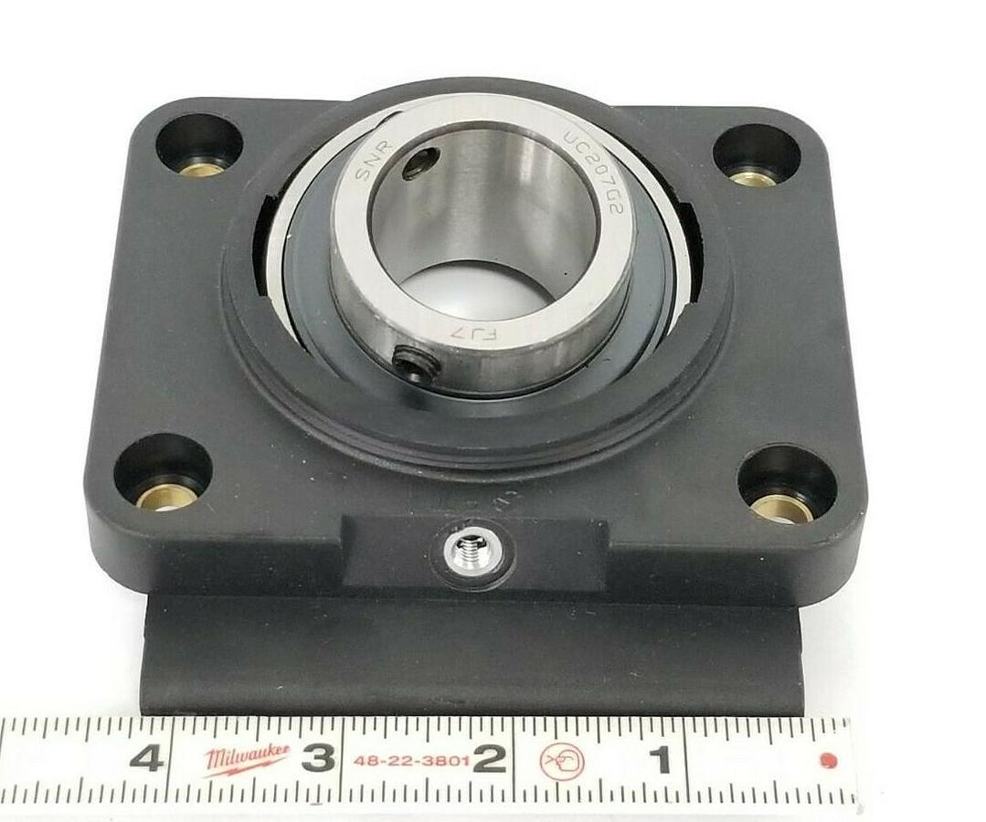 Used NEW SNR UC207G2 FJ7 BEARING INSERT W/ BRG METRIC 4-BOLT FLANGE 35MM BORE