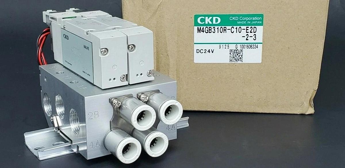 Used NIB CKD M4GB310R-C10-E2D-2-3 VALVE MANIFOLD ASSEMBLY DC24V M4GB310RC10E2D23