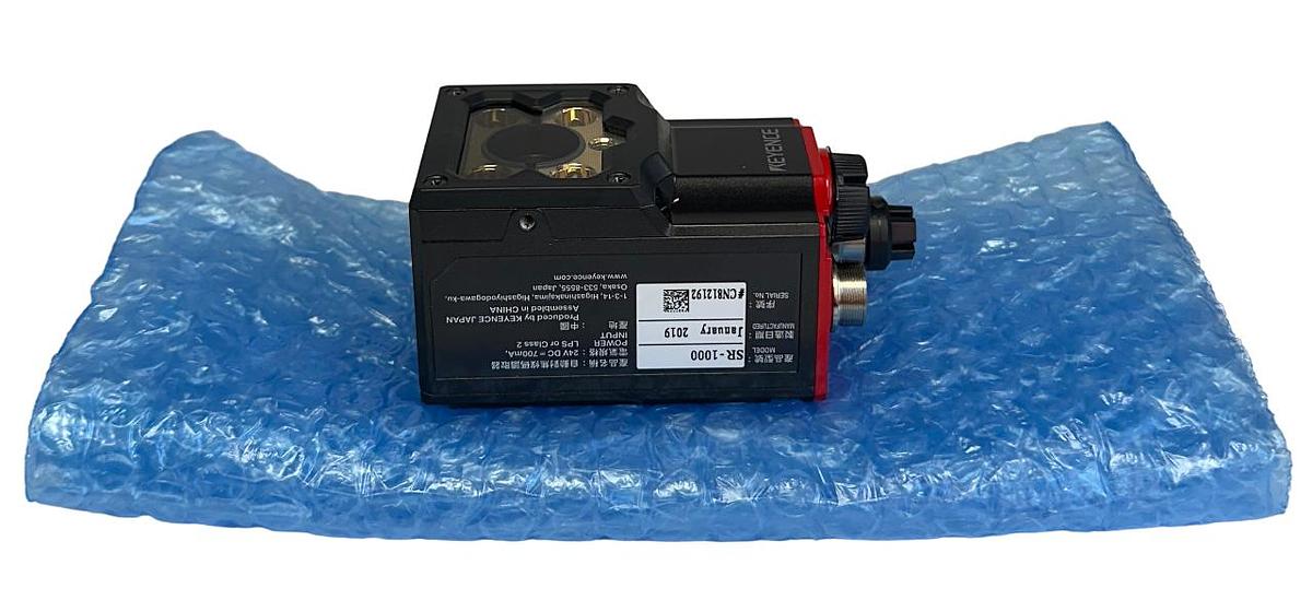 Used KEYENCE SR-1000 / SR1000 AUTOFOCUS CODE READER FIXED TYPE 24VDC 700mA NSMP
