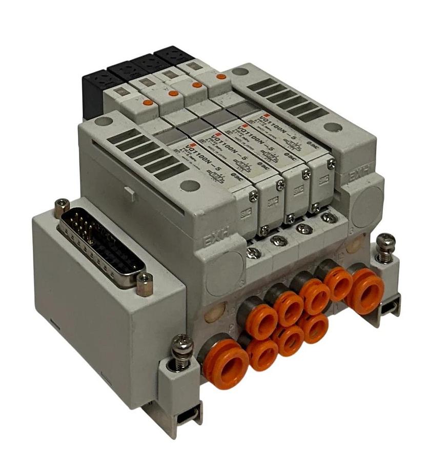 Used SMC EXH MANIFOLD BANK/BLOCK 4-PORT W/ VQ1100N-5 SOLENOID VALVES 24VDC USNP