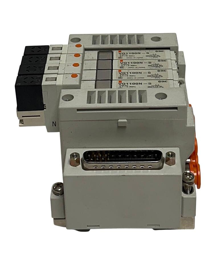 Used SMC EXH MANIFOLD BANK/BLOCK 4-PORT W/ VQ1100N-5 SOLENOID VALVES 24VDC USNP