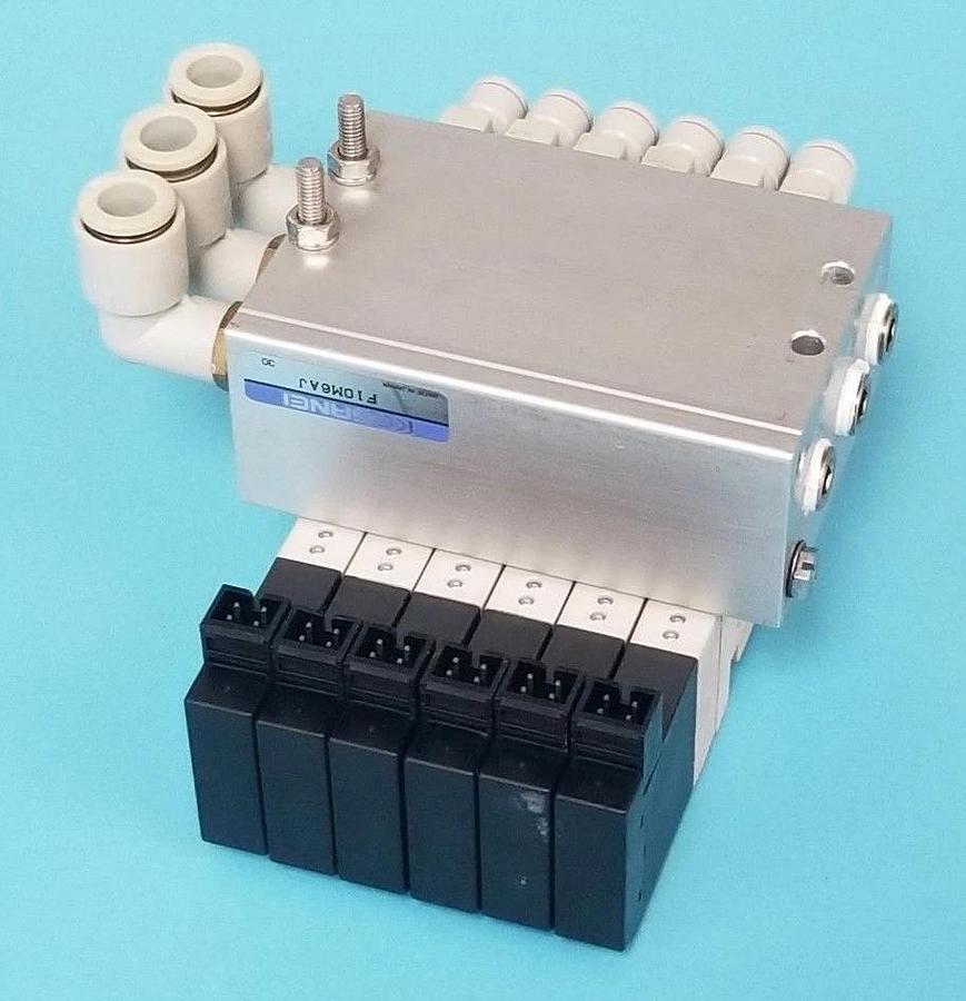 Used KOGANEI F10M6AJ BASE W/ 6 F10T1-CPL3 SOLENOID VALVES DC24V