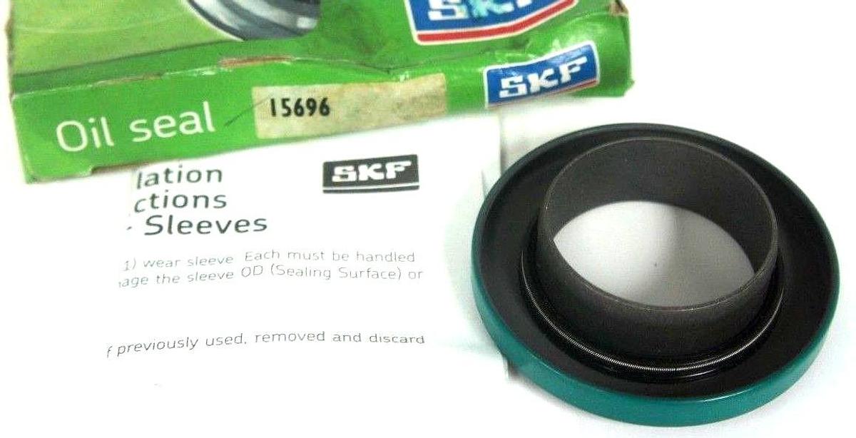 Used NIB SKF 15696 OIL SEAL AND SLEEVE KIT 1.563 X 2.623 X .750