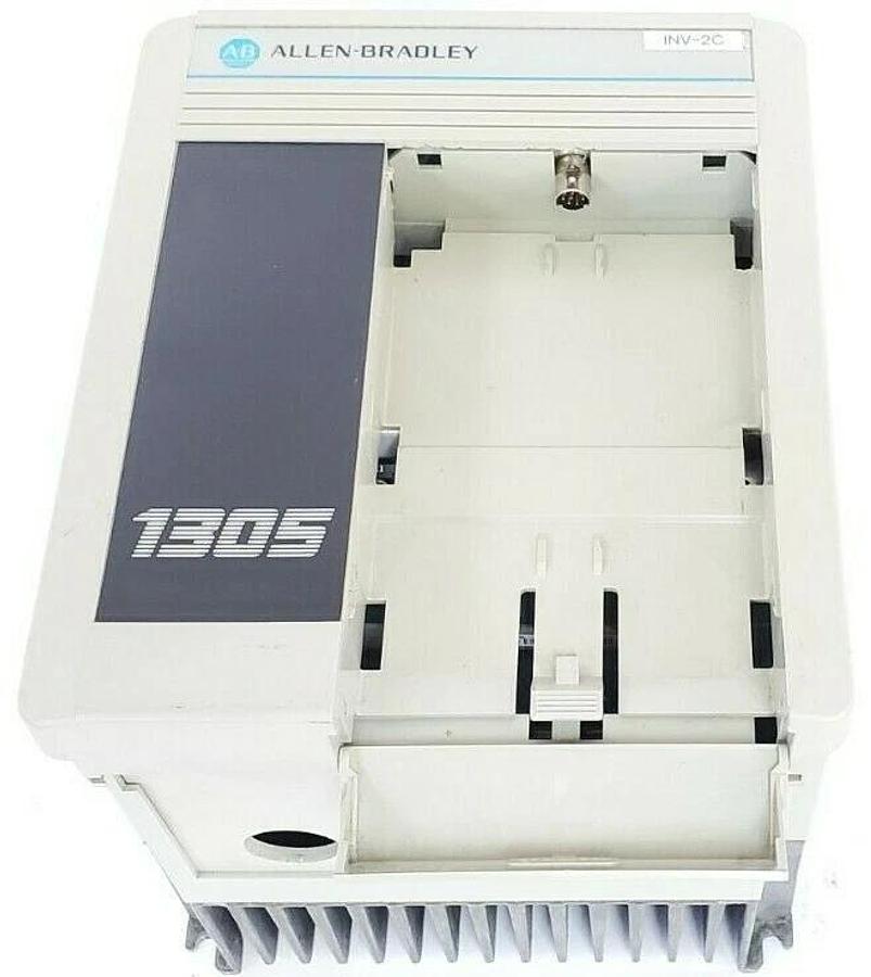 Used ALLEN BRADLEY 1305-BA03A-HA2 AC DRIVE SER. B 3 PH 1HP 0.75KW W/ 1201-HA2