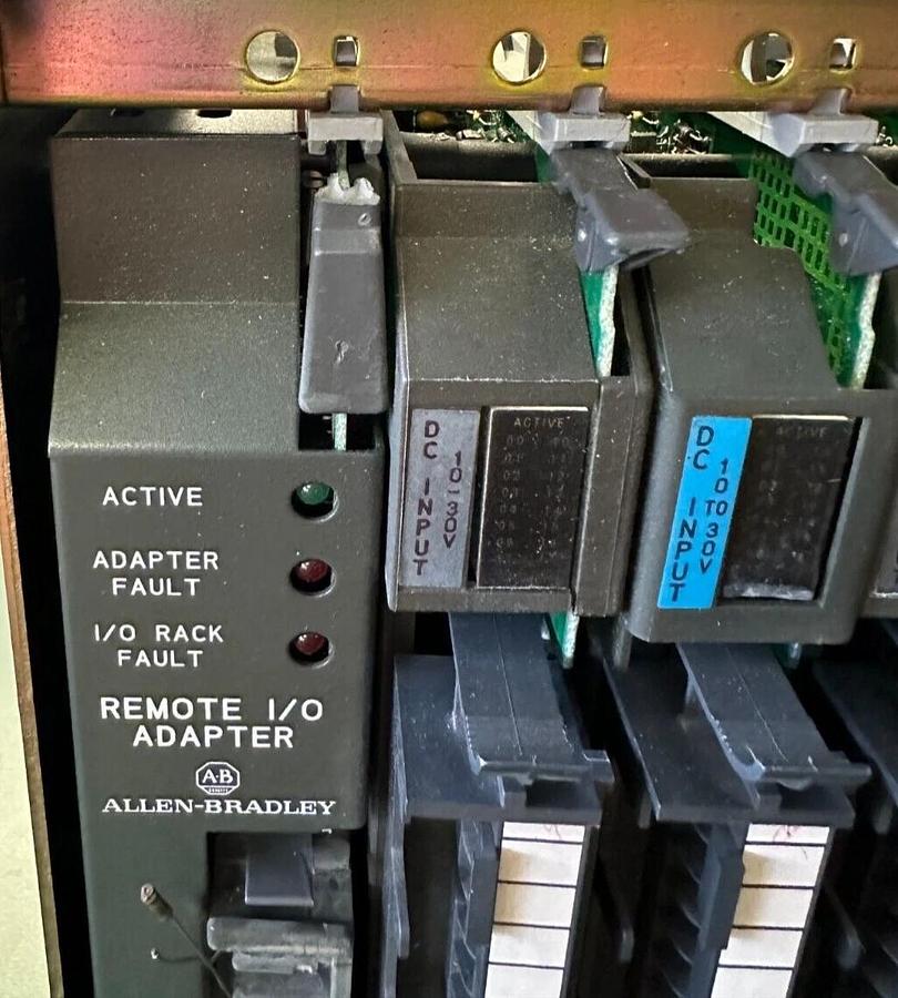 Used ALLEN BRADLEY 1771-A4B SER B 16-SLOT I/O CHASIS W/ MODULES