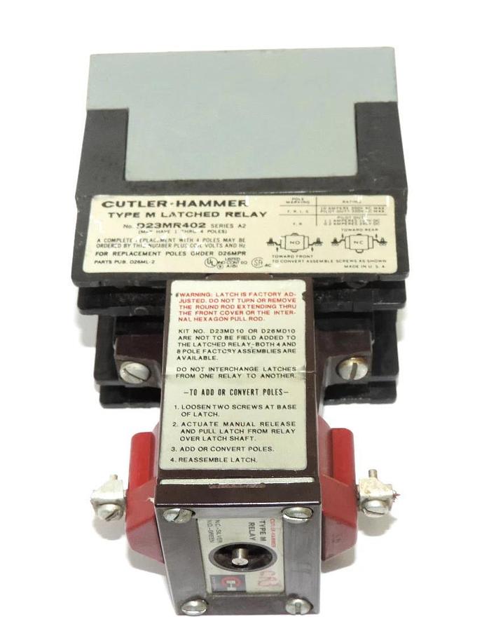 Used CUTLER-HAMMER D23MR402 TYPE M LATCHED RELAY SERIES A2 W/ 1886-1 & 9-1989-1 COILS