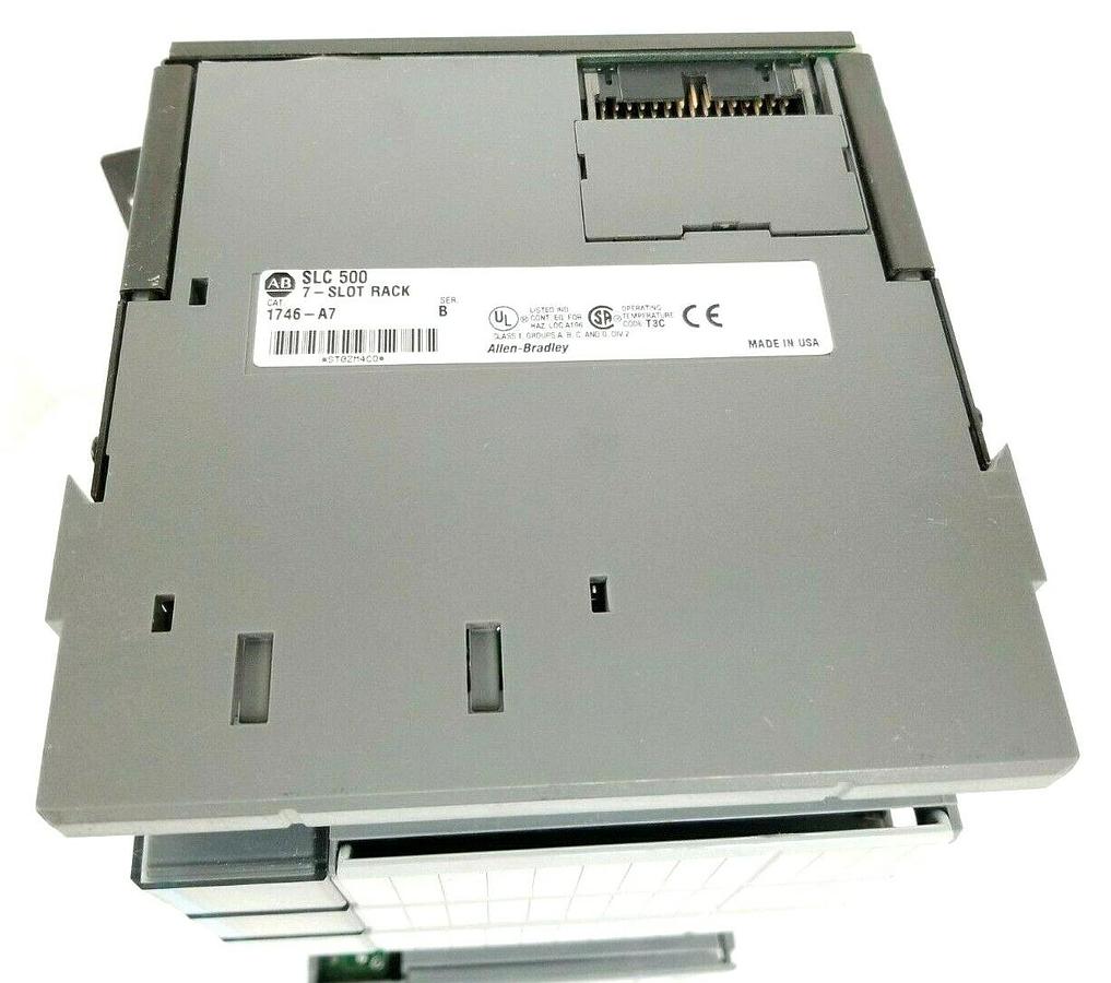 Used ALLEN BRADLEY 1746-A7 SLOT RACK W/ 1746-P2 , (2) 1746-IB16 , 1746-OB16 (DAMAGED)