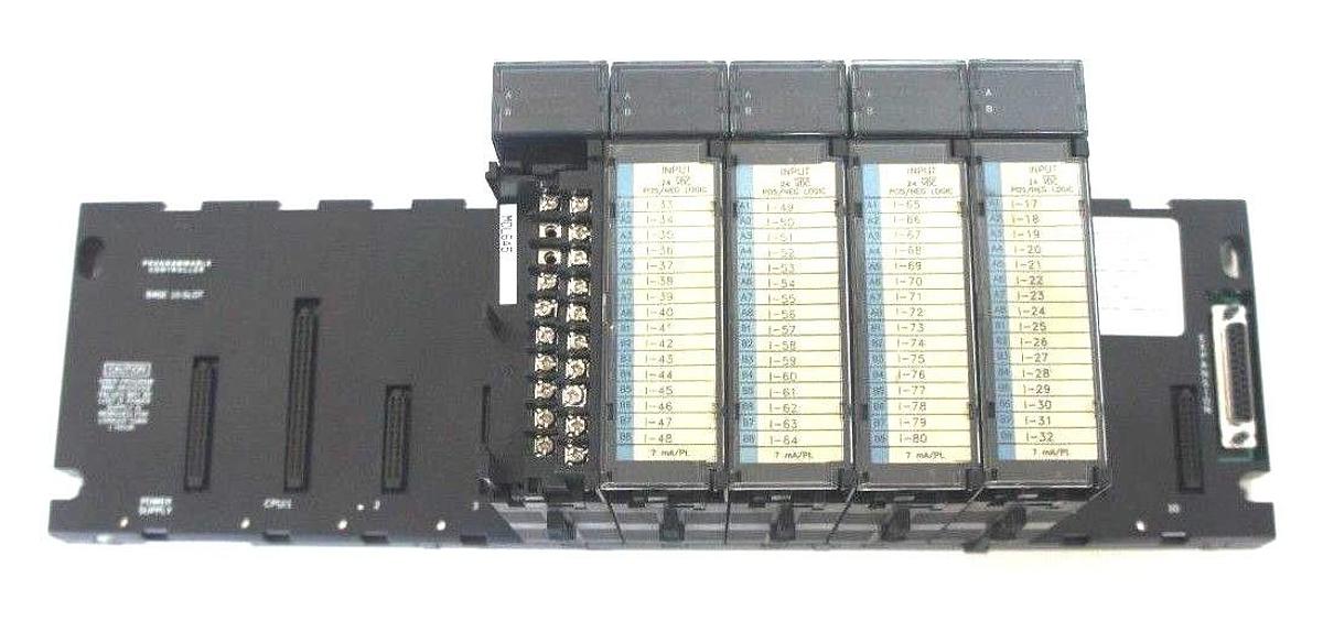Used GE FANUC IC693CHS391H 10 SLOT RACK W/ (4) IC693MDL645D & (1) IC693MDL740E