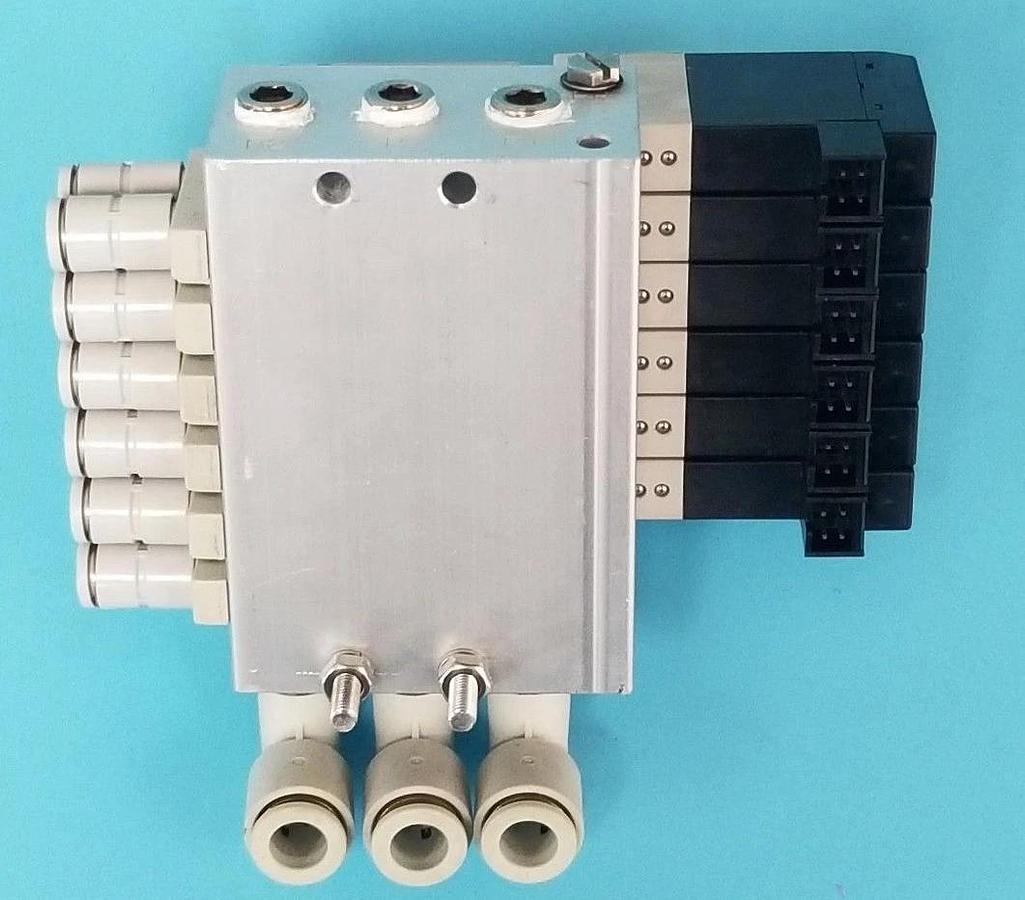 Used KOGANEI F10M6AJ BASE W/ 6 F10T1-CPL3 SOLENOID VALVES DC24V