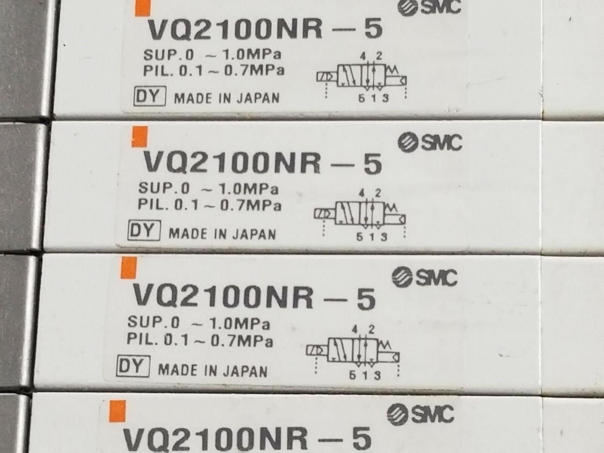 Used SMC 10 POS. MANIFOLD BLOCK WITH (9) VQ2100NR-5 PLUG-IN SOLENOID VALVES VQ2100NR5