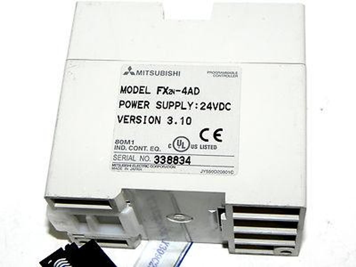 Used MITSUBISHI FX2N-4AD ANALOG OUTPUT MODULE FX2N4AD USED