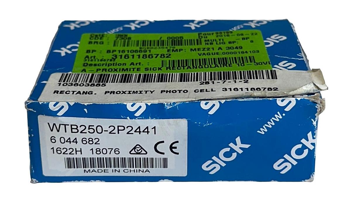 Used NEW SICK WTB250-2P2441 / 6044682 PHOTOELECTRIC PROXIMITY SENSOR 10-30VDC NSMP