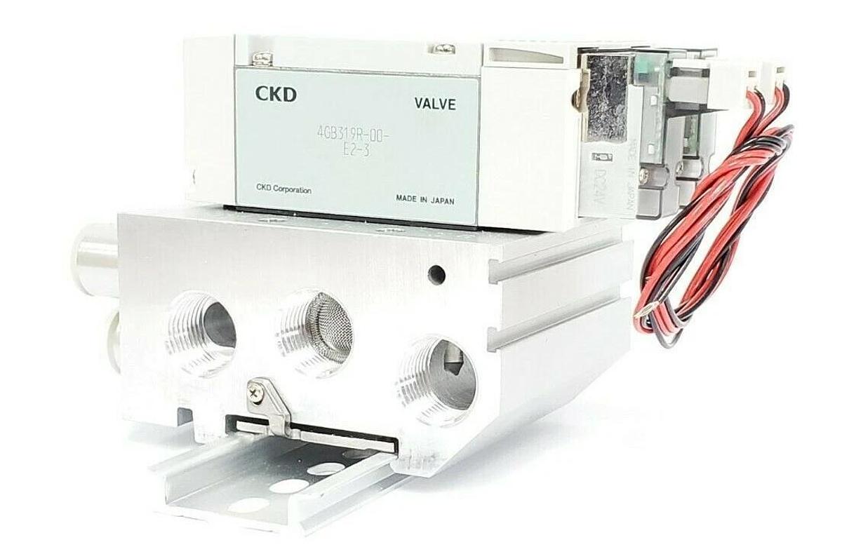 Used NIB CKD M4GB310R-C10-E2D-2-3 VALVE MANIFOLD ASSEMBLY DC24V M4GB310RC10E2D23