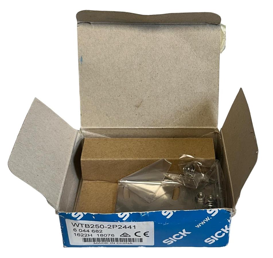 Used NEW SICK WTB250-2P2441 / 6044682 PHOTOELECTRIC PROXIMITY SENSOR 10-30VDC NSMP